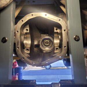 Ring and pinion inspection during Dana 35 rear rebuild on Jeep Wrangler JL
